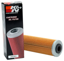 Load image into Gallery viewer, K&amp;N 1.625in OD x 5.05in H Oil Filter - Installation View