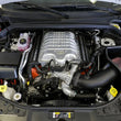Load image into Gallery viewer, K&amp;N 18-19 Jeep Grand Cherokee Trackhawk V8-6.2L F/I AirCharger Performance Intake - Installation View