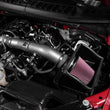Load image into Gallery viewer, K&amp;N 18-24 Ford F150 3.3L V6 Performance Air Intake System w/ Red Air Filter - Side View