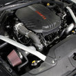 Load image into Gallery viewer, K&amp;N 2018 Kia Stinger 3.3L Turbo Typhoon Air Intake - Side View