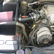 Load image into Gallery viewer, K&amp;N 96-00 Chevy/GMC PickUp V8-7.4L Performance Intake Kit - Back View