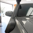 Load image into Gallery viewer, K&amp;N Engineering Elevated Intake Kit (Snorkel) V6 3.5L fits 2016-2023 Toyota Tacoma - Back View