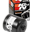 Load image into Gallery viewer, K&amp;N Honda / Kawasaki / Yamaha / Polaris / Victory 2.688in OD x 3.344in H Oil Filter - Installation View
