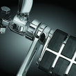 Load image into Gallery viewer, Kuryakyn 1-1/4in Stirrup Heel Rest Extenders Chrome - Side View