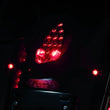 Load image into Gallery viewer, Kuryakyn Rear Turn Signal &amp; License Plate Mount Indian Black - Installation View