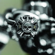 Load image into Gallery viewer, Kuryakyn Replacement Zombie Grip Emblems With Throttle Boss Chrome - Detail View