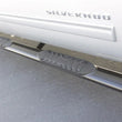 Load image into Gallery viewer, Lund 01-13 Chevy Silverado 1500 Crew Cab 5in. Oval Straight SS Nerf Bars - Polished - Side View