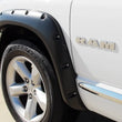 Load image into Gallery viewer, Lund 02-08 Dodge Ram 1500 RX-Rivet Style Smooth Elite Series Fender Flares - Black (4 Pc.) - Back View