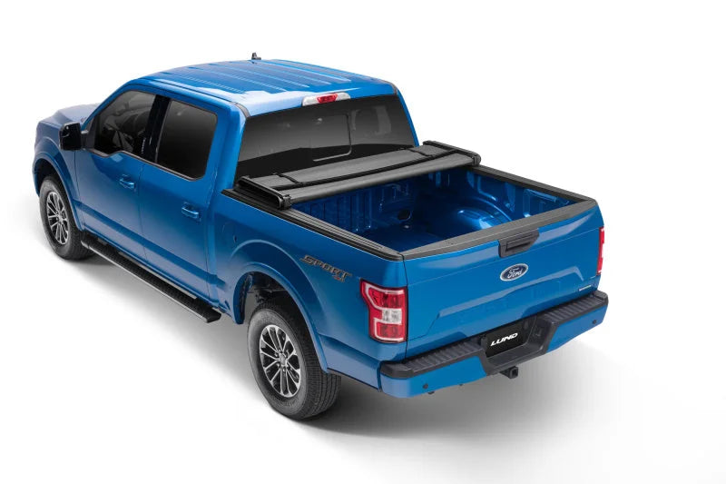 Lund 04-14 Ford F-150 (5.5ft. Bed) Genesis Elite Tri-Fold Tonneau Cover - Black - Side View