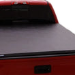 Load image into Gallery viewer, Lund 04-15 Nissan Titan (5.5ft. Bed) Hard Fold Tonneau Cover w/Bracket Kit - Black - Main Product View