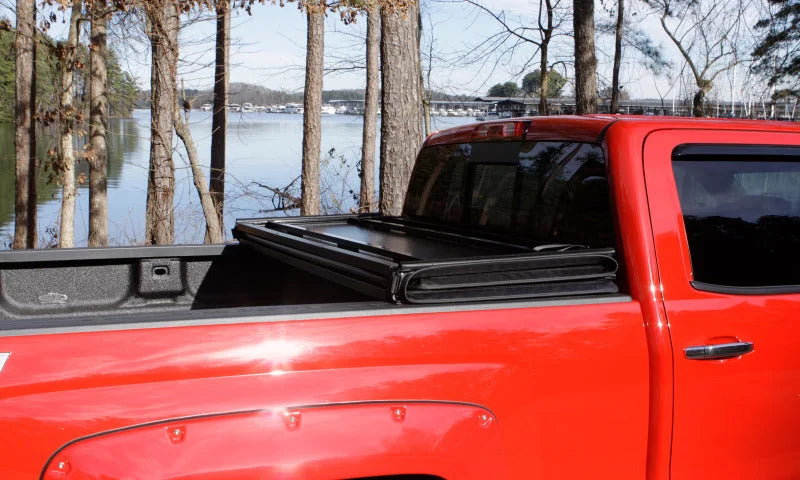 Lund 04-15 Nissan Titan (5.5ft. Bed) Hard Fold Tonneau Cover w/Bracket Kit - Black - Additional View 16
