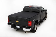 Load image into Gallery viewer, Lund 07-13 Chevy Silverado 1500 (6.5ft. Bed) Genesis Elite Tri-Fold Tonneau Cover - Black - Side View