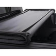 Load image into Gallery viewer, Lund 07-13 Chevy Silverado 1500 (6.5ft. Bed) Genesis Tri-Fold Tonneau Cover - Black - Installation View