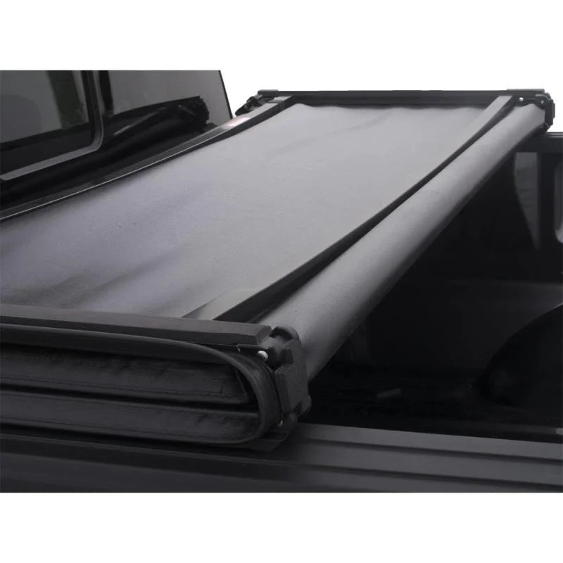 Lund 07-13 Chevy Silverado 1500 (6.5ft. Bed) Genesis Tri-Fold Tonneau Cover - Black - Installation View