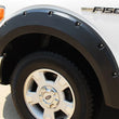 Load image into Gallery viewer, Lund 09-14 Ford F-150 (Excl Raptor) RX-Rivet Style Smooth Elite Series Fender Flares - Black (4 Pc.) - Installation View