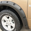 Load image into Gallery viewer, Lund 09-17 Dodge Ram 1500 RX-Rivet Style Textured Elite Series Fender Flares - Black (4 Pc.) - Additional View 5