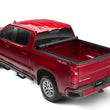 Load image into Gallery viewer, Lund 15-17 Chevy Colorado (5ft. Bed) Genesis Elite Roll Up Tonneau Cover - Black - Installation View