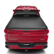 Load image into Gallery viewer, Lund 15-17 Chevy Colorado (5ft. Bed) Genesis Roll Up Tonneau Cover - Black - Side View