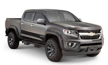 Load image into Gallery viewer, Lund 15-17 Chevy Colorado Crew Cab Terrain HX Step Nerf Bars - Black - Installation View