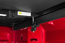 Load image into Gallery viewer, Lund 15-17 Chevy Colorado Fleetside (6ft. Bed) Hard Fold Tonneau Cover - Black - Additional View 14
