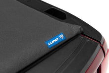 Load image into Gallery viewer, Lund 16-23 Toyota Tacoma (5ft. Bed) Hard Fold Tonneau Cover - Black - Installation View