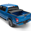 Load image into Gallery viewer, Lund 22-23 Nissan Frontier 5ft. Bed - Genesis Elite Tri-Fold Tonneau Cover - Black - Side View