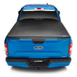 Load image into Gallery viewer, Lund 22-23 Nissan Frontier 6ft. Bed - Genesis Tri-Fold Tonneau Cover - Black - Back View