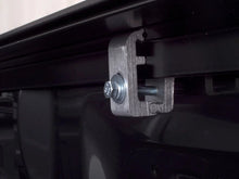 Load image into Gallery viewer, Lund 96-04 Dodge Dakota (6.5ft. Bed) Genesis Roll Up Tonneau Cover - Black - Back View