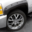 Load image into Gallery viewer, Lund 99-07 Chevy Silverado 1500 RX-Rivet Style Textured Elite Series Fender Flares - Black (4 Pc.) - Side View