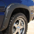 Load image into Gallery viewer, Lund 99-07 Chevy Silverado 1500 RX-Rivet Style Textured Elite Series Fender Flares - Black (4 Pc.) - Additional View 5