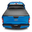 Load image into Gallery viewer, Lund 99-17 Ford F-250 Super Duty Styleside (6.8ft. Bed) Hard Fold Tonneau Cover - Black - Additional View 6