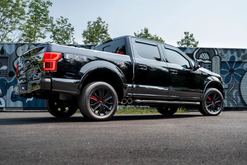 MBRP 15-20 Ford F150 Pre-Axle 4in OD Tips Dual Outlet 3in Black Coated Cat Back Exhaust - Installation View