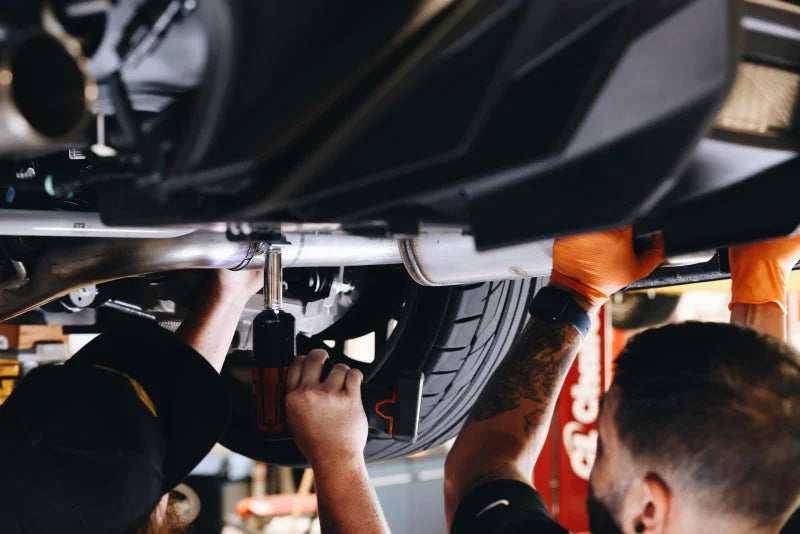 MBRP 18-22 Ford Mustang 2.3L Ecoboost 3in Cat-Back Exhaust w/ Quad Carbon Fiber SS Tips - T304 - Installation View