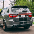 Load image into Gallery viewer, MBRP 18-23 Dodge Durango SRT 6.4L Armor Pro T304 SS 3in Cat Back Exhaust Dual Rear Exit w/ CF Tips - Installation View