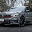 Load image into Gallery viewer, MBRP 19-21 VW Jetta GLI T304 SS 3in Cat-Back Dual Split Rear Exit Exhaust - Carbon Fiber Tips - Side View