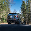 Load image into Gallery viewer, MBRP 20-21 Ford Explorer ST 3.0L Ecoboost SS 2.5in Dual Rear Exit w/ Carbon Fiber Quad Tips - T304 - Installation View