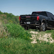 Load image into Gallery viewer, MBRP 20-23 Chevrolet Silverado 2500HD 6.6L Armor Plus T409 SS Single Side Exit 5in DPF Back Exhaust - Installation View