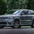 Load image into Gallery viewer, MBRP 2012+ Jeep Grand Cherokee SRT 6.4L 3in Dual Rear Exit T304SS Catback Exhaust - CF Tips - Back View