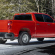 Load image into Gallery viewer, MBRP 2019+ Chevrolet Silverado 1500 / 2019+ GMC Sierra 1500 T304 SS 3in Armor Pro Cat-Back Exhaust - Installation View