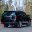 Load image into Gallery viewer, MBRP 2021+ Chevy Tahoe / GMC Yukon T304 SS 3in Cat-Back Dual Split Exhaust w/ Quad Carbon Fiber Tips - Installation View