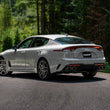 Load image into Gallery viewer, MBRP 2022 Kia Stinger 3.3L T304 SS Cat-Back Exhaust- Dual Split Rear Quad Outlet Uses Factory Bezels - Installation View