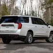 Load image into Gallery viewer, MBRP 21-24 Chevrolet Suburban XL 5.3L 3in Aluminized 2.5in Dual Split Carbon Fiber Cat-back - Back View