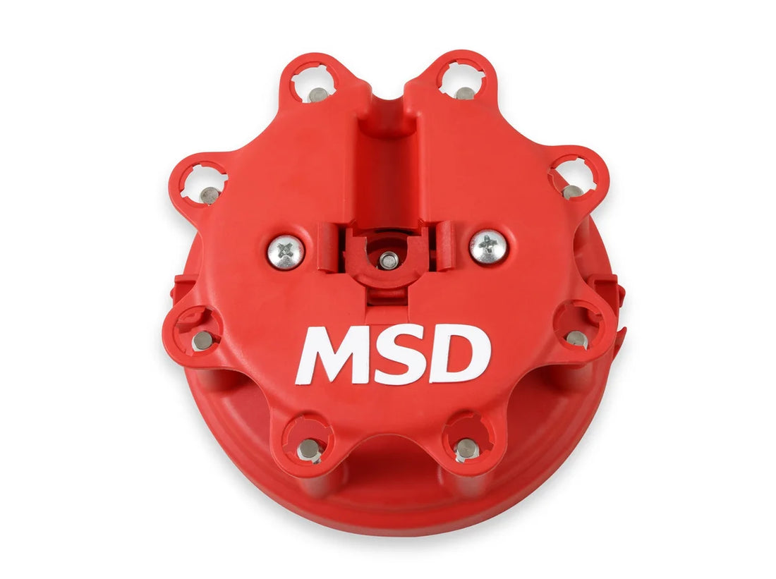 MSD The Ford-style cap has a provision for the coil wire to be routed in separately. 8408 - Side View