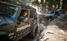 Load image into Gallery viewer, MagnaFlow 07-18 Jeep Wrangler JK Overland Series Axle-Back Exhaust System - Installation View