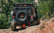 Load image into Gallery viewer, MagnaFlow 07-18 Jeep Wrangler JK Overland Series Axle-Back Exhaust System - Additional View 5