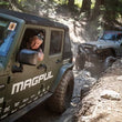 Load image into Gallery viewer, MagnaFlow 12-18 Jeep Wrangler 2.5in Overland Series Cat-Back Exhaust - Installation View