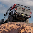 Load image into Gallery viewer, MagnaFlow 20-23 Jeep Gladiator JT 3.6L Overland Series Cat-Back Exhaust - Side View