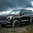 Load image into Gallery viewer, MagnaFlow 2023 Toyota Sequoia Overland Series Black Axle-Back Exhaust - Side View