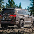 Load image into Gallery viewer, MagnaFlow 2023 Toyota Sequoia Overland Series Black Axle-Back Exhaust - Back View
