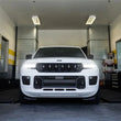 Load image into Gallery viewer, MagnaFlow 21-23 Jeep Grand Cherokee L NEO Cat-Back Exhaust - Installation View